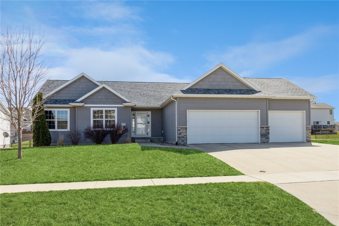 Property Photo:  317 Barrington Parkway  IA 52302 