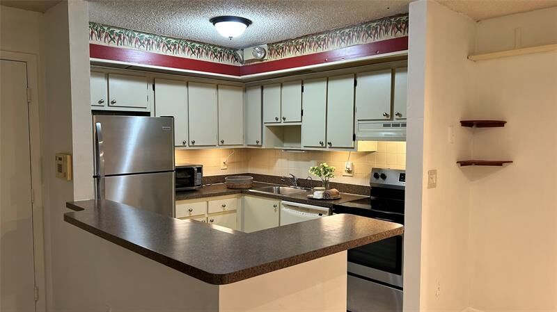 Property Photo:  9702 S Belfort Cir 112  FL 33321 