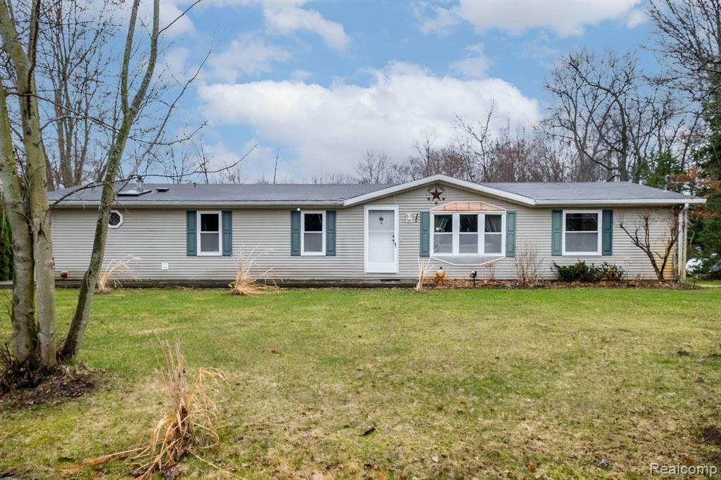 Property Photo: 1257 Tonda Drive MI 48462 9759