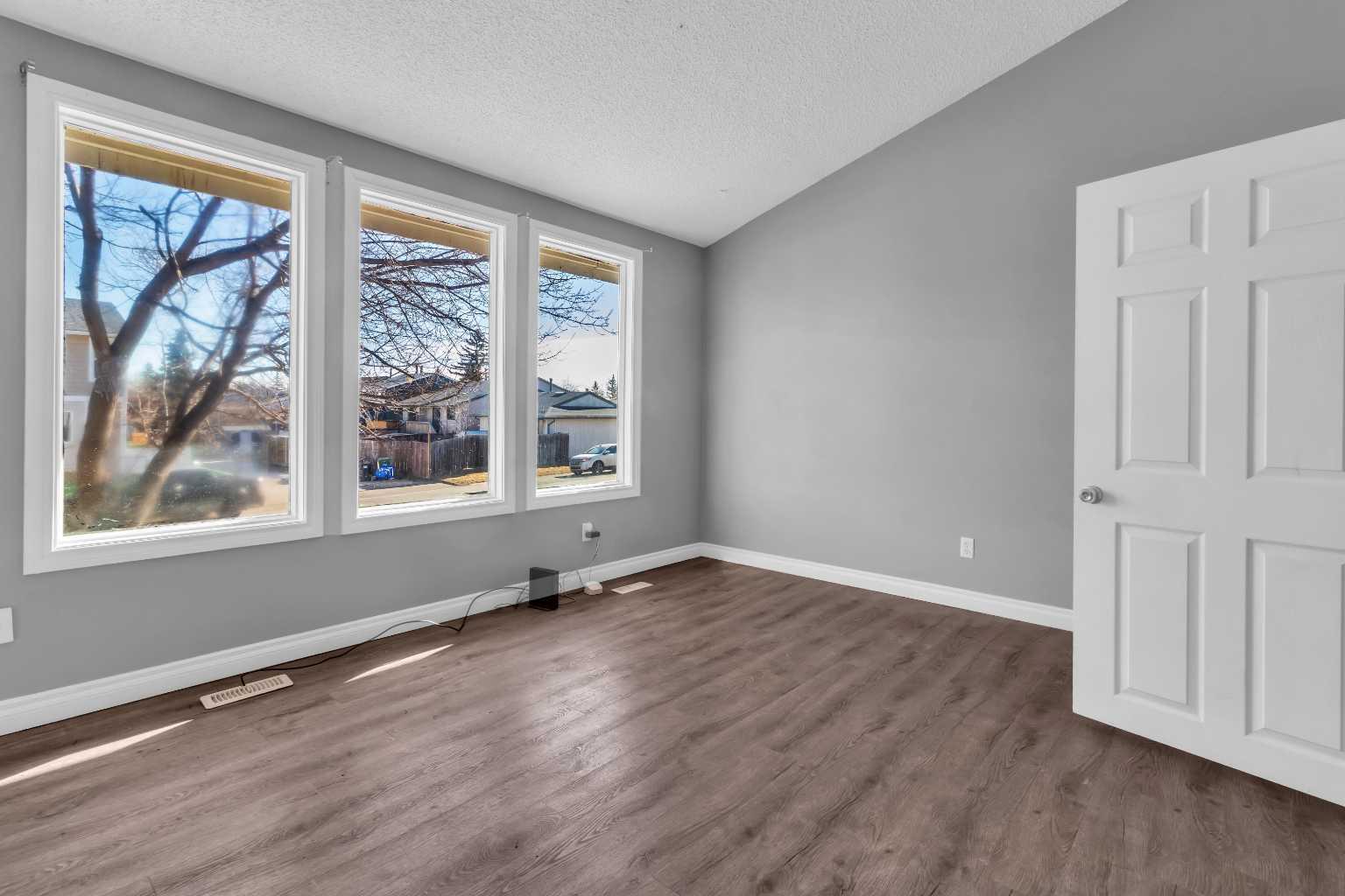 Property Photo: 111 Pinemill Mews NE AB T1Y 4R6