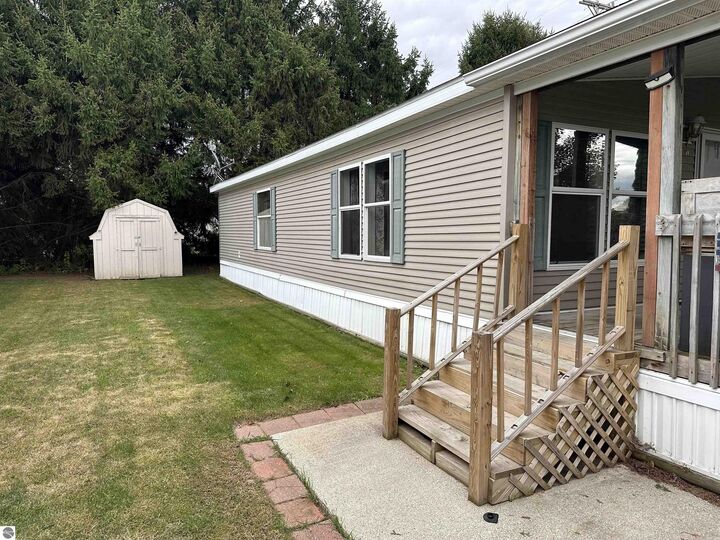 Property Photo:  5232 E Broadway Road 151  MI 48858 