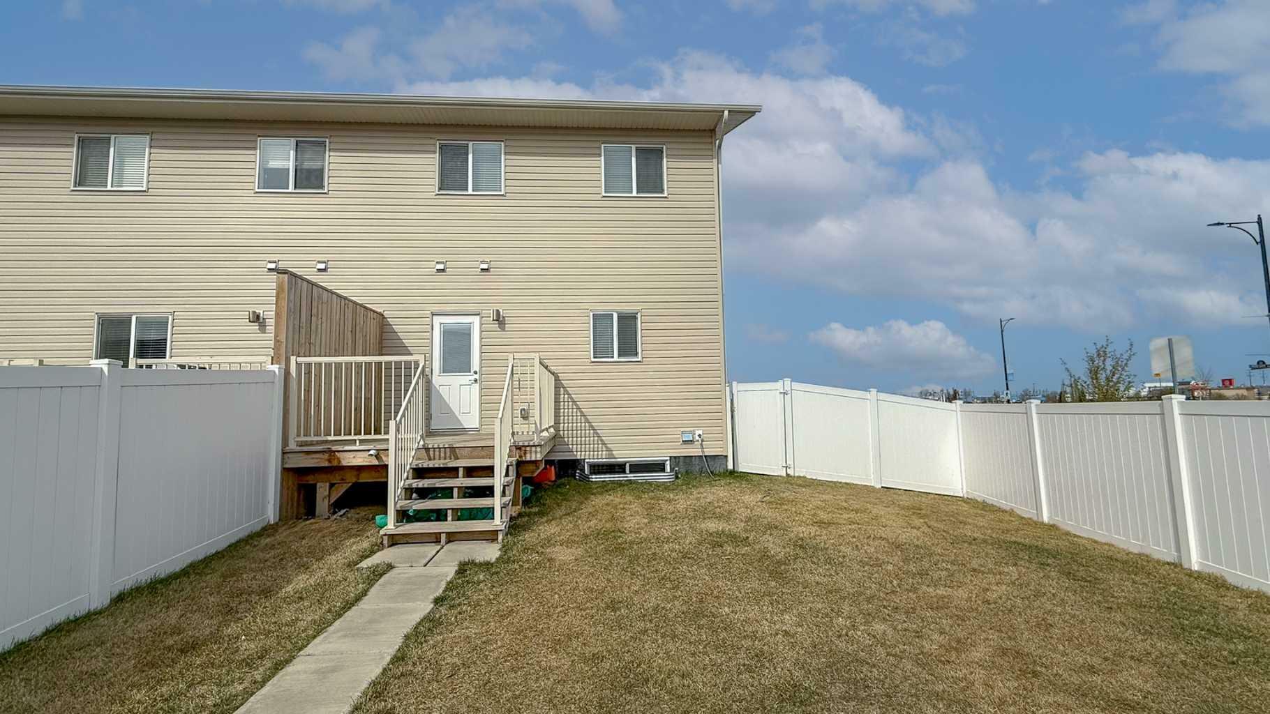 Property Photo: 1 Iron Gate Boulevard AB T4S 0T6