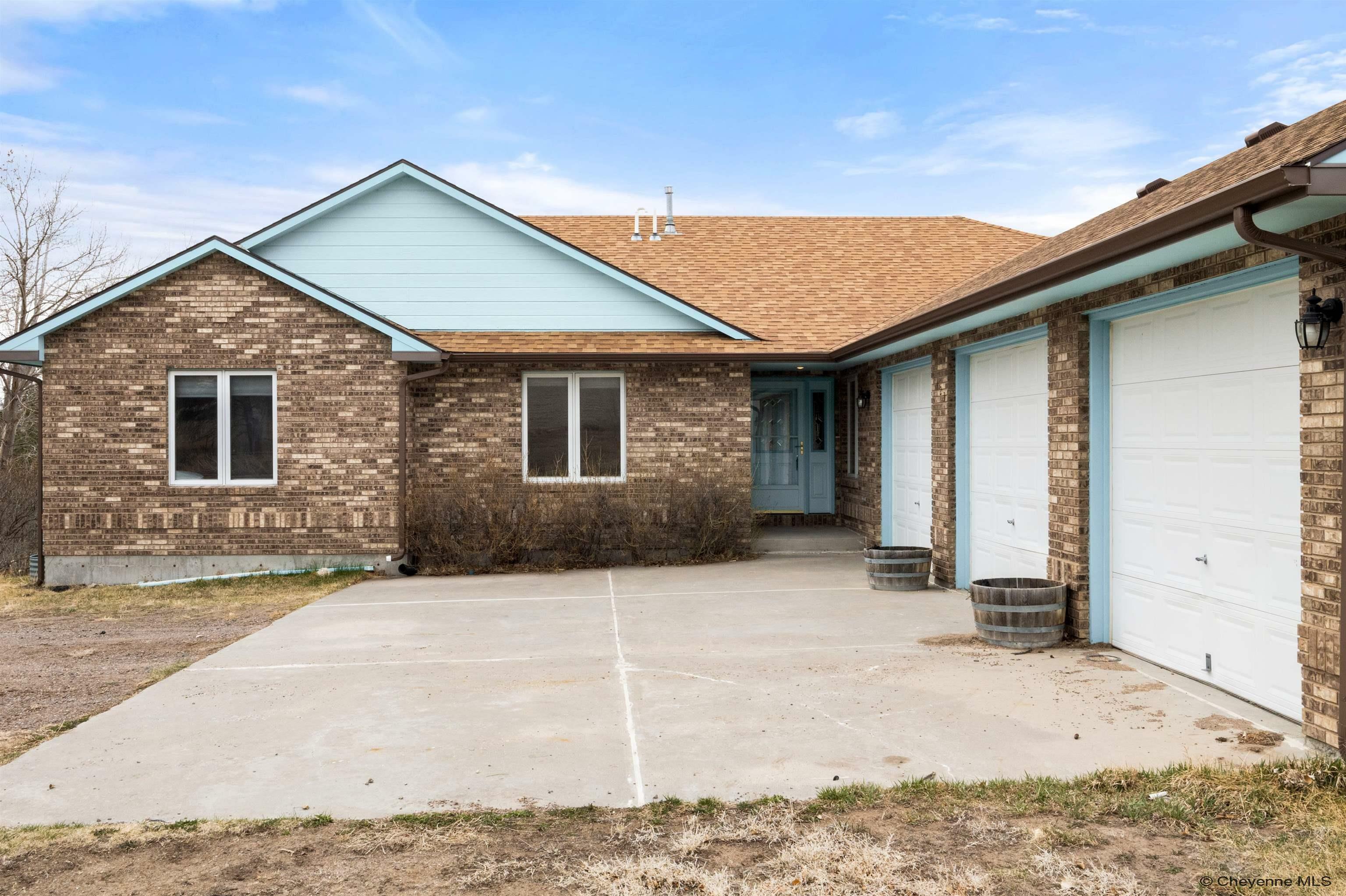 Property Photo: 1423 Deerbrooke Trl WY 82009