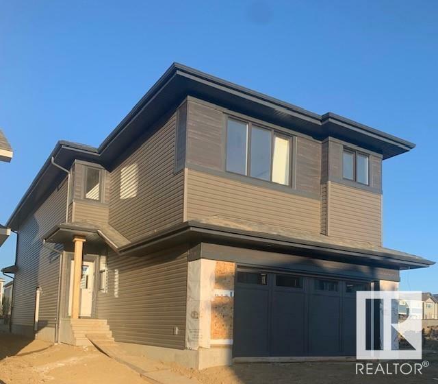 Property Photo:  13035 212 Street NW  AB T5S 0T8 