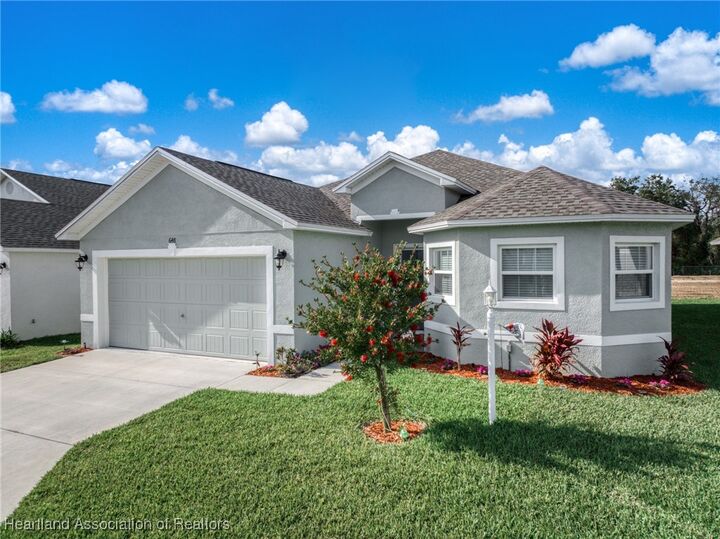 Property Photo:  648 W Carmichael Street  FL 33825 