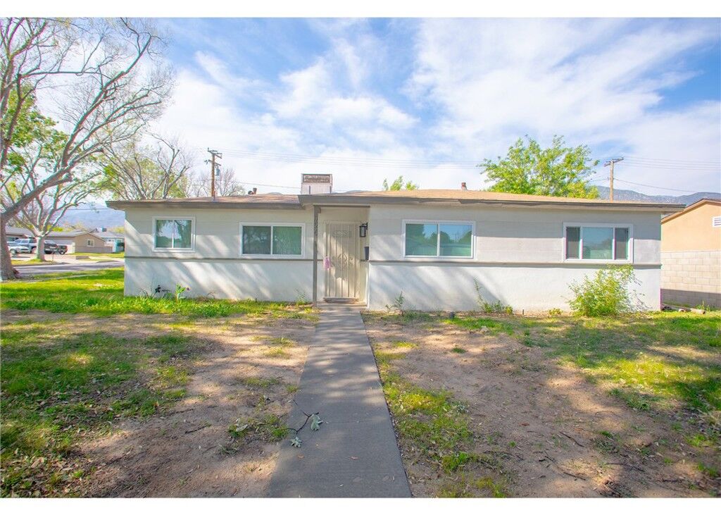 Property Photo:  496 W 48th Street  CA 92407 