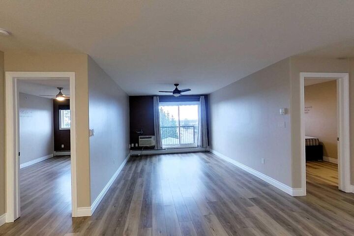 Property Photo: 5037 7 Avenue 406 AB T7E 0A8