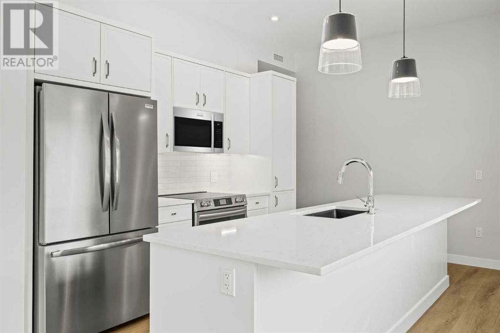 Property Photo: 209 Stewart Creek Rise AB T1W 0N9