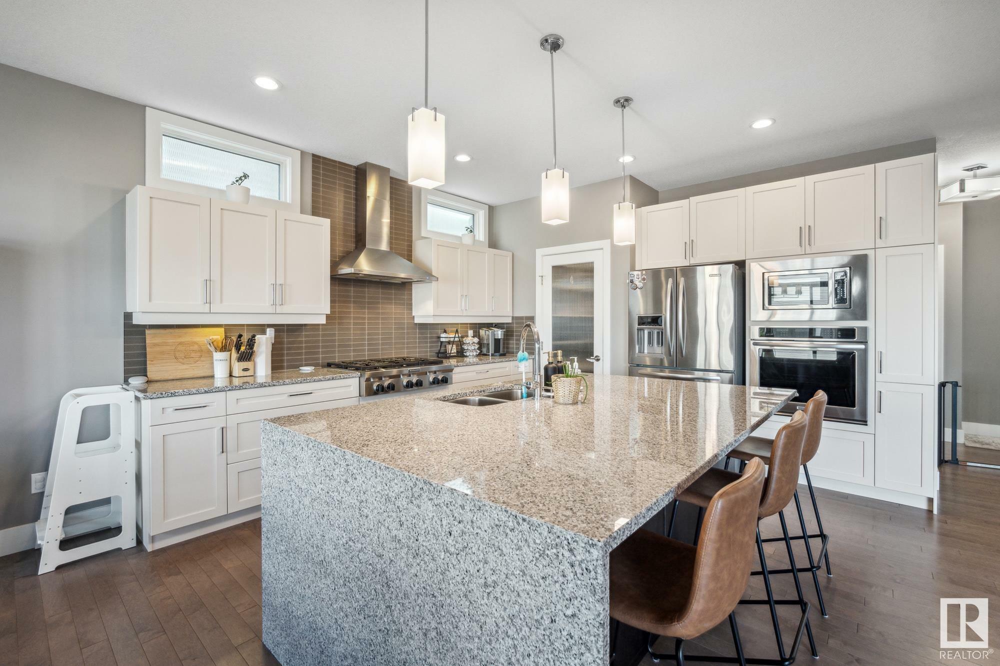 Property Photo: 2135 Glenridding Way SW AB T6W 2H4