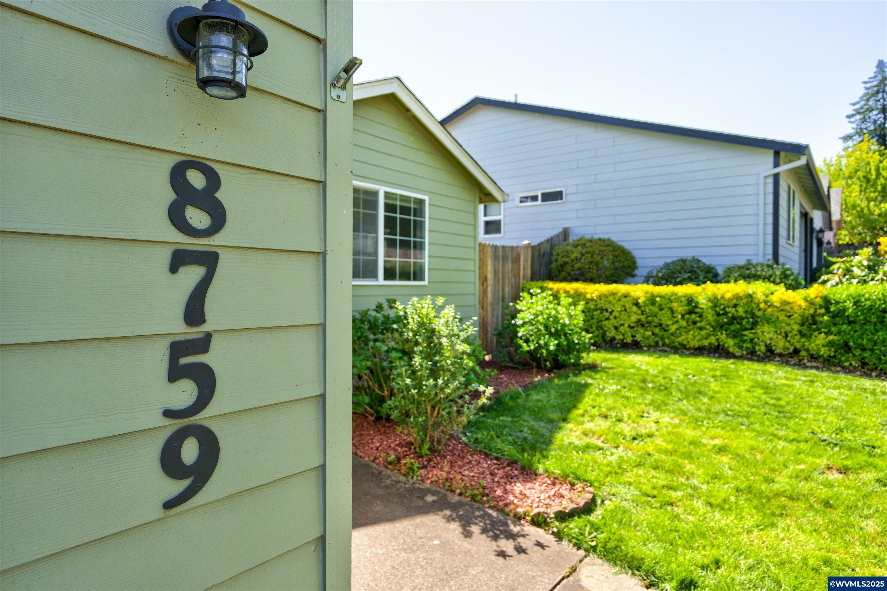 Property Photo: 8759 NE Box Elder St OR 97330