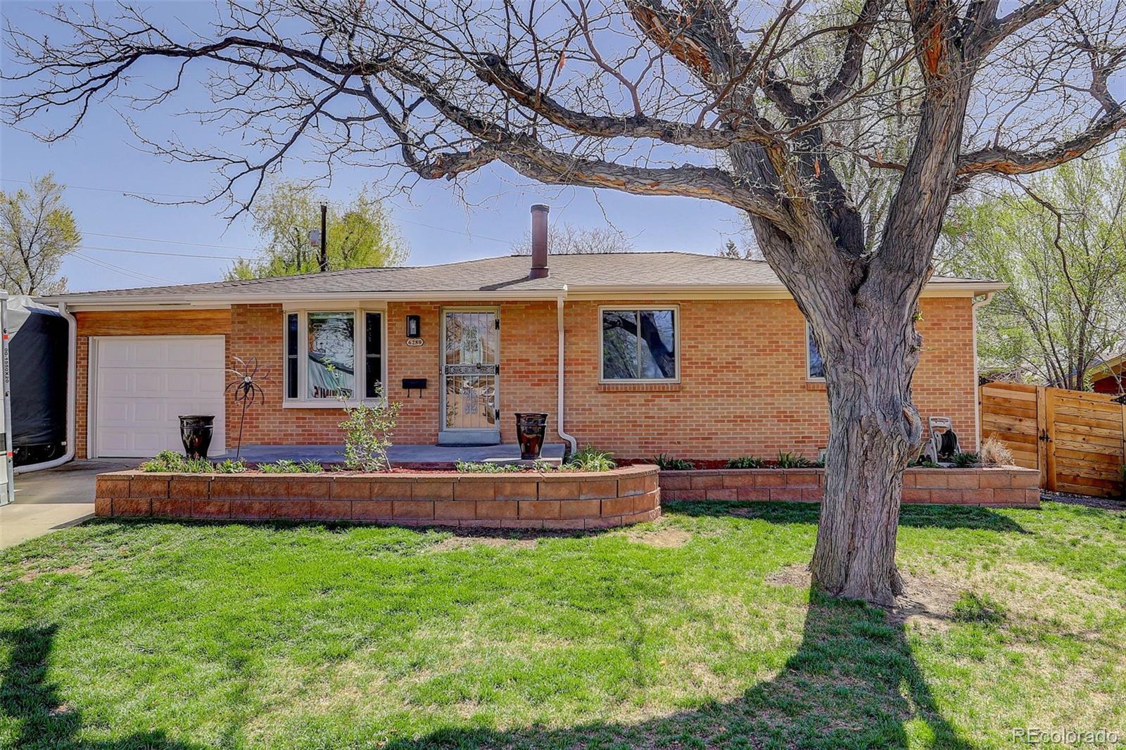 Property Photo:  6280 Quay Street  CO 80003 