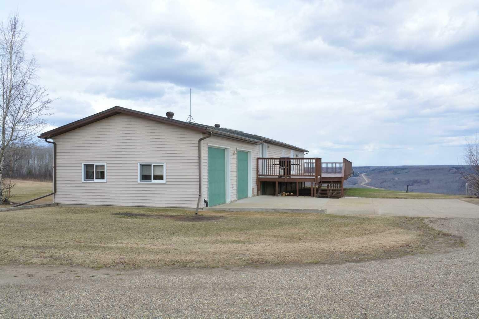 Property Photo: 212045 Twp Rd 852 AB T8S 1S4