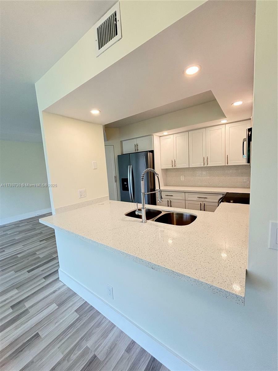 Property Photo: 100 SW 130th Ter 303C FL 33027