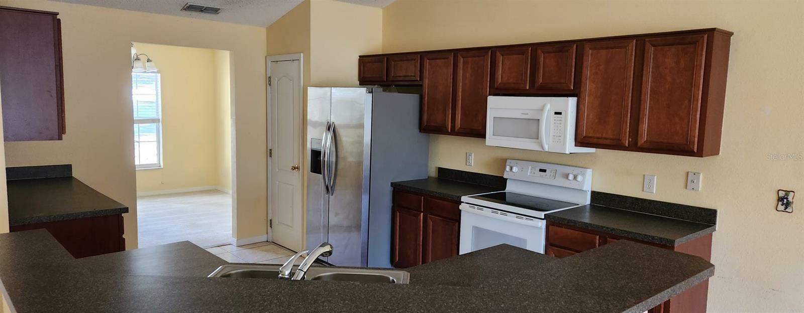 Property Photo: 697 Winding Lake Drive FL 34711