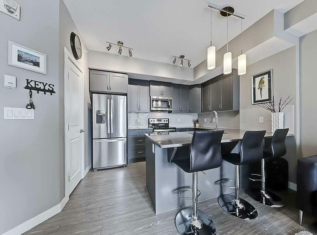 Property Photo: 3727 Sage Hill Drive NW 1403 AB T3R 1J1