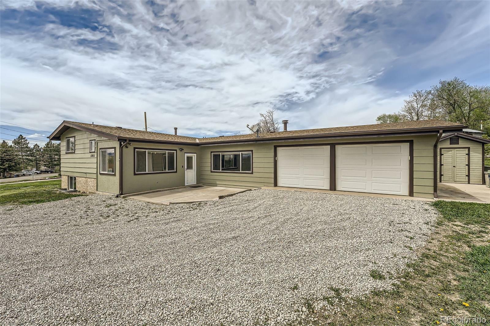 Property Photo: 13805 W 82nd Avenue CO 80005