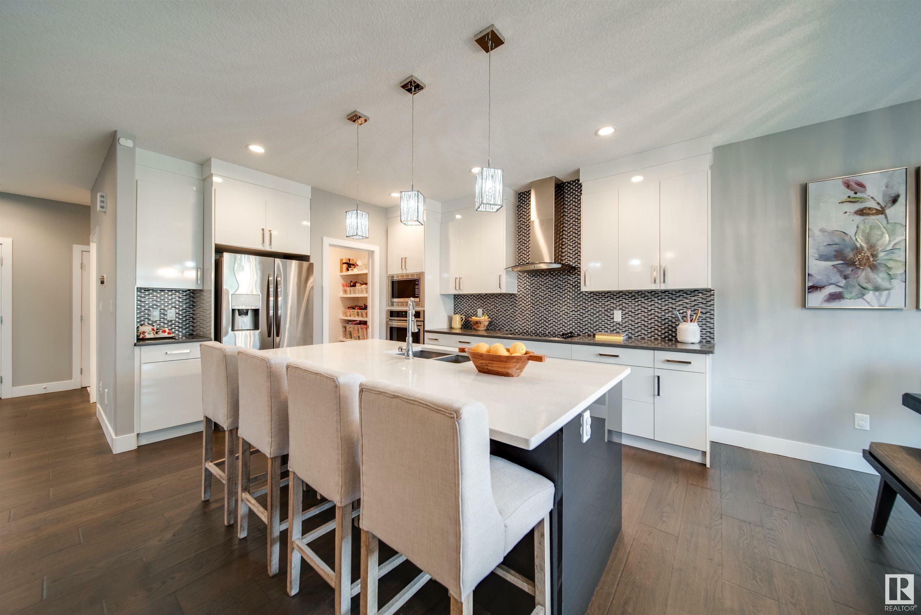 Property Photo: 1216 152 Avenue NW AB T5Y 0Z5