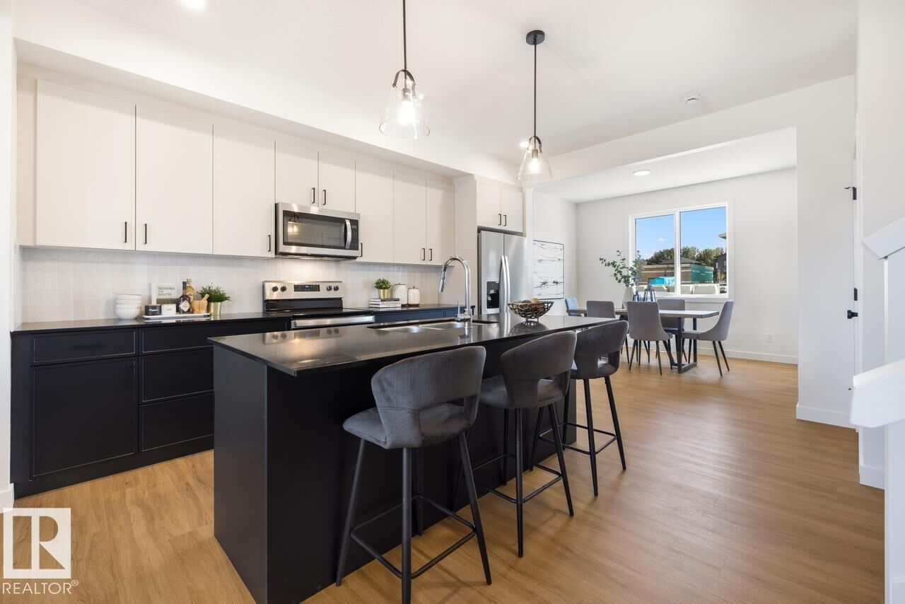 Property Photo:  10241 92A Avenue  AB T8R 1A0 