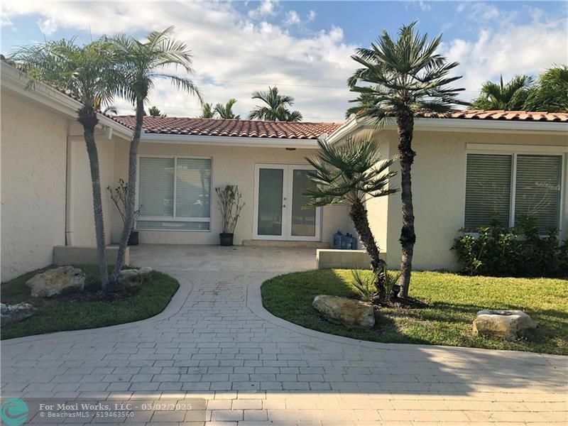Property Photo: 5911 NE 22nd Way FL 33308