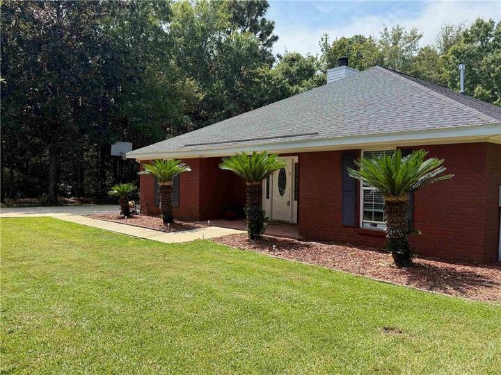 Property Photo: 9830 Pineview Avenue AL 36582