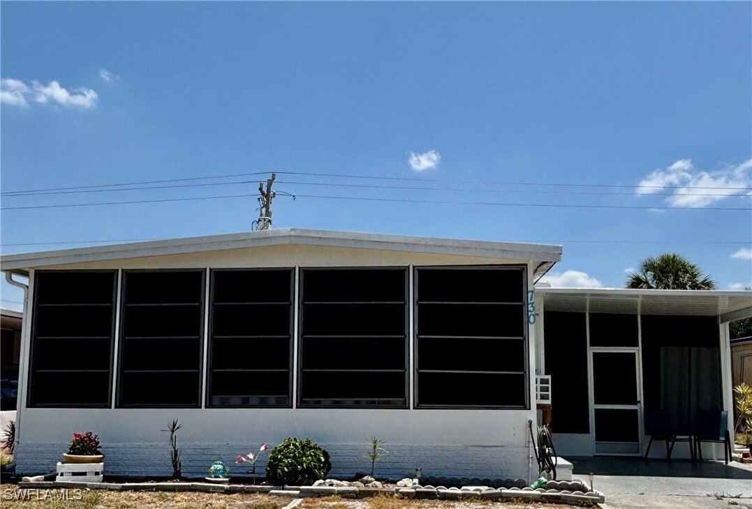Property Photo: 730 Knotty Pine Circle FL 33917