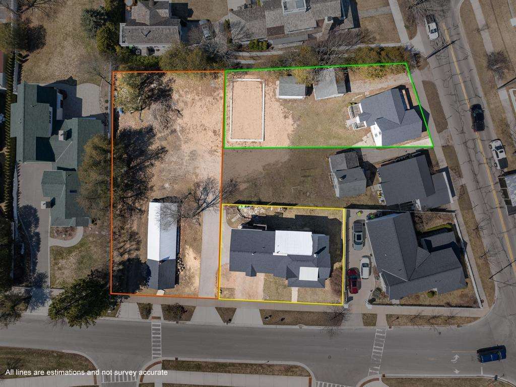 Property Photo: 181 Zoll 588 E Main St &Amp 161 Zoll St MI 49740