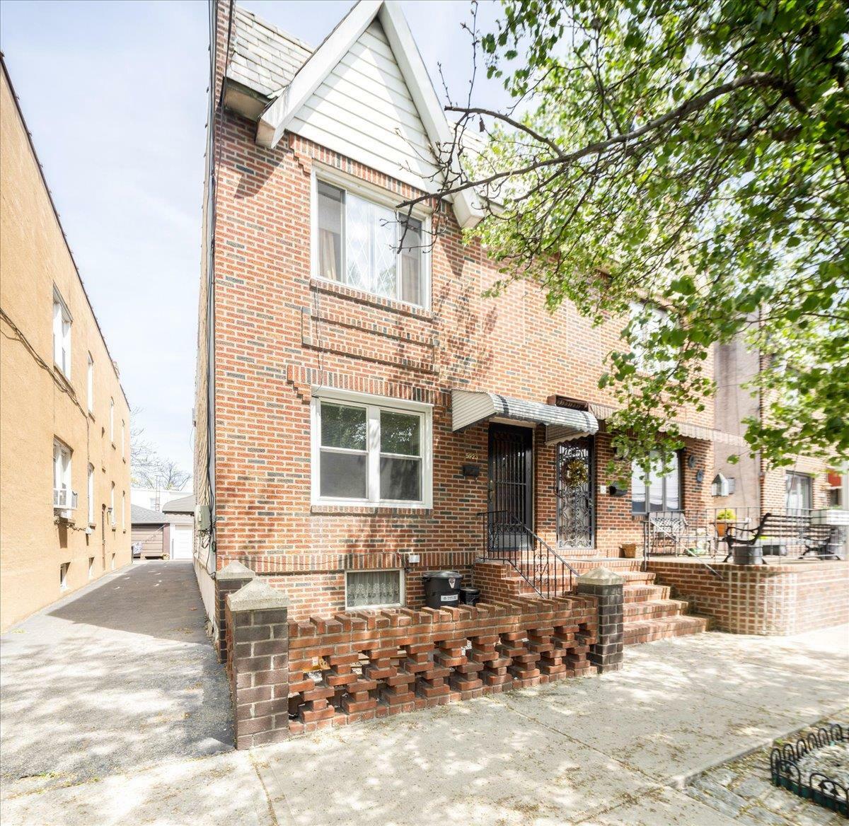 Property Photo: 59-23 69th Lane NY 11378