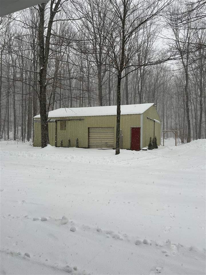 Property Photo: 8118 E Mitchell MI 49770