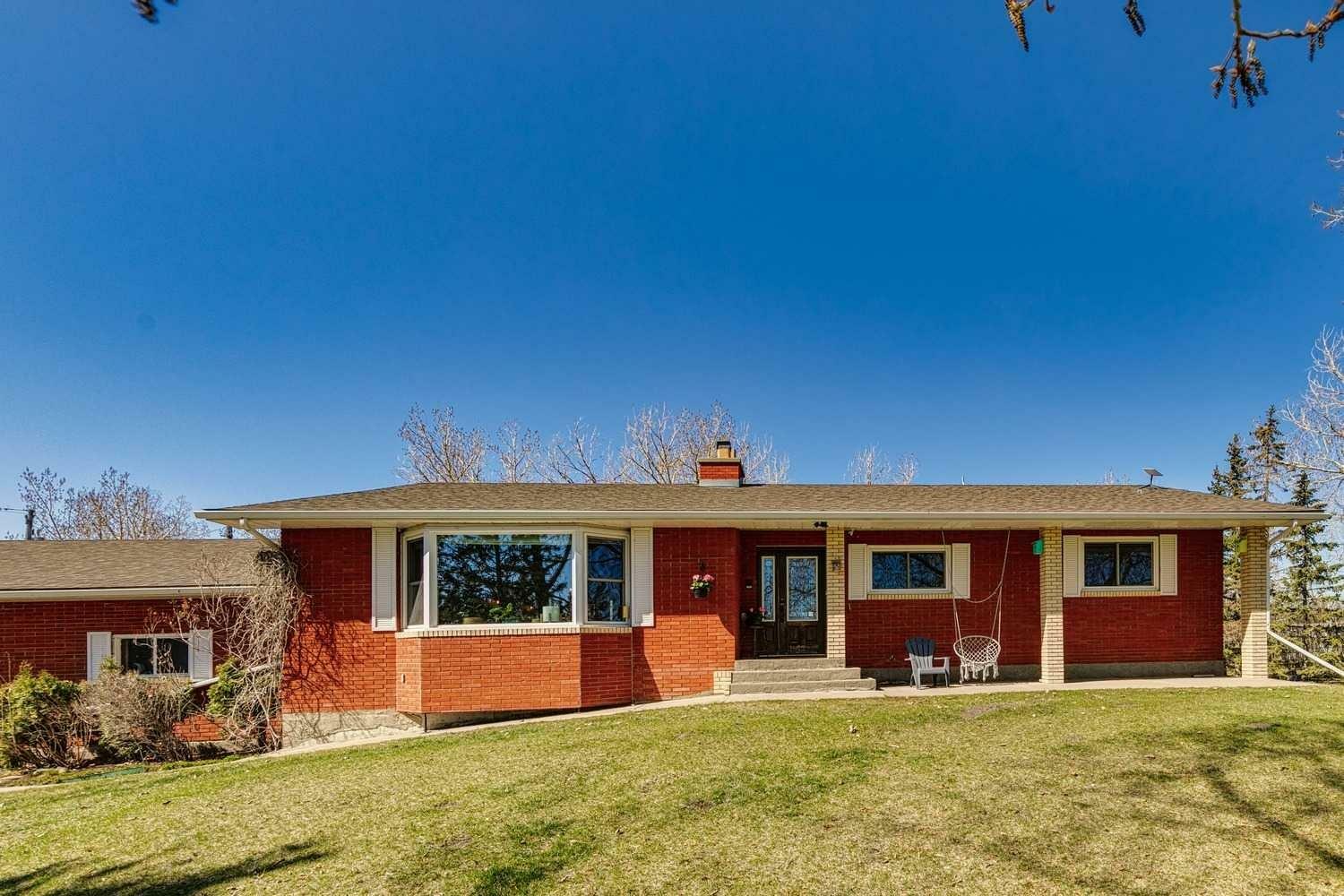 Property Photo: 11 Dry Creek Bay SW AB T4B 2Z8