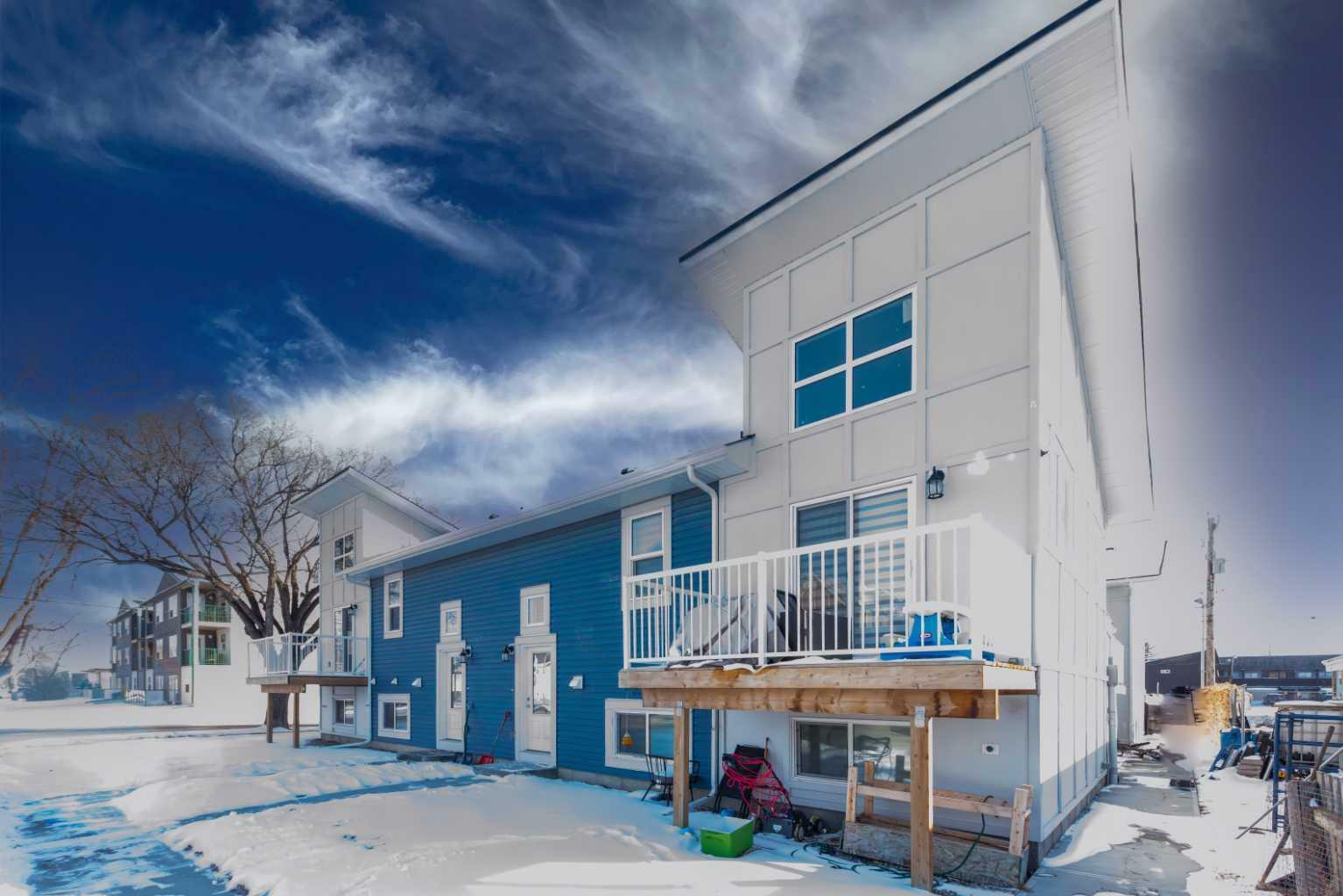 Property Photo: 41 7 Avenue SE 5 AB T1V 1E9