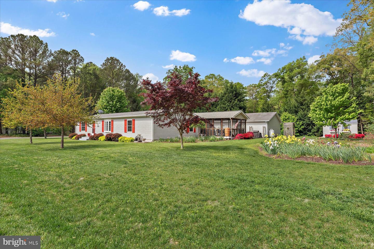 Property Photo: 35978 Squirrels Run Circle DE 19970