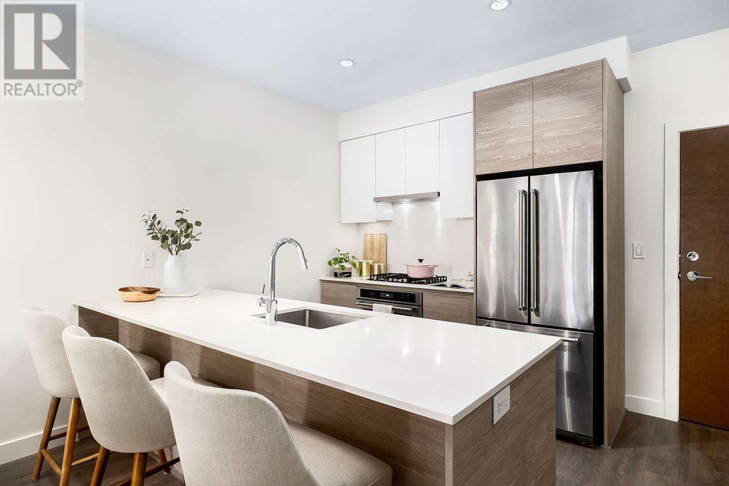 Property Photo: 4468 Dawson Street 212 BC V5C 0J9