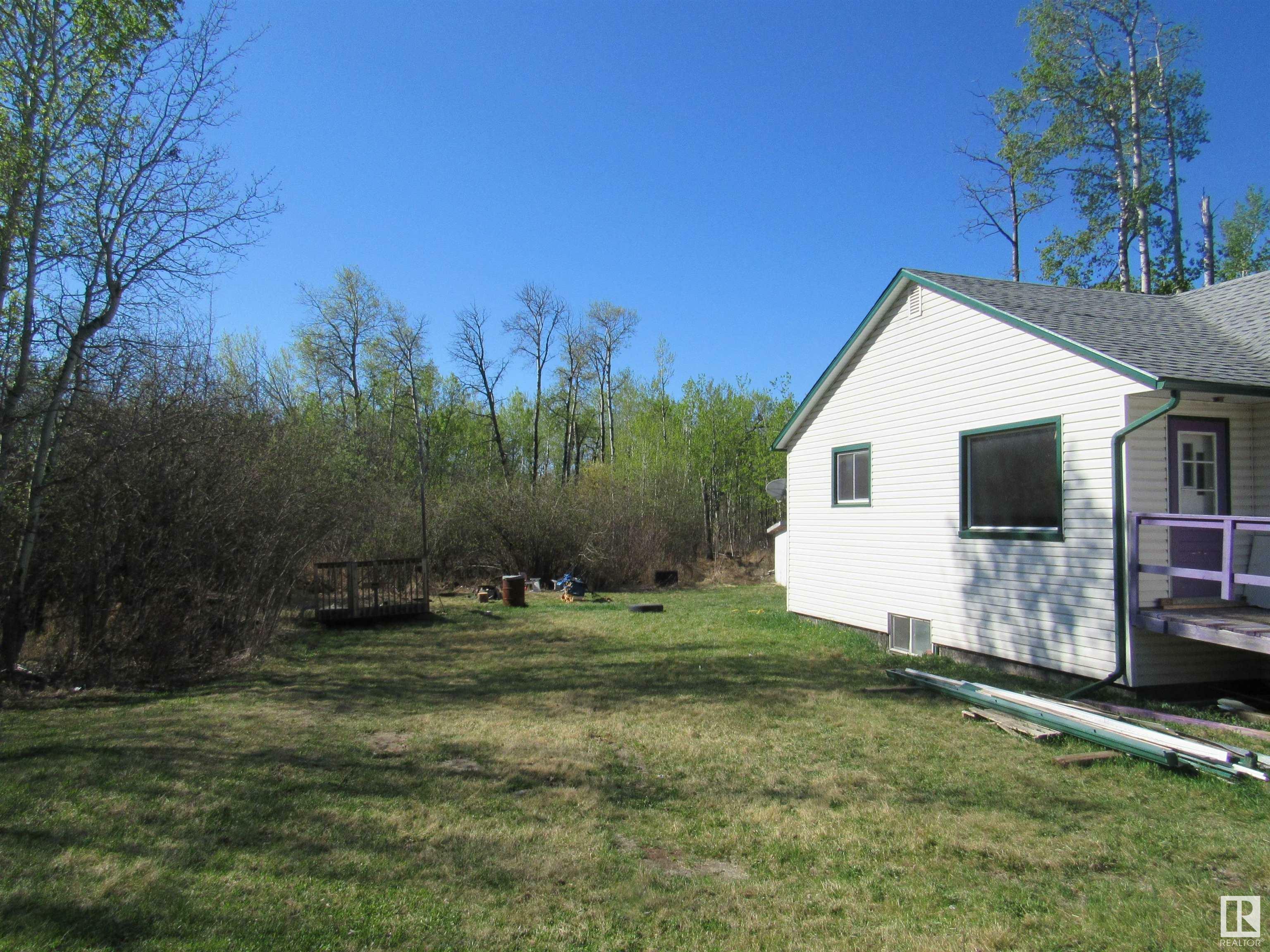 Property Photo:  101 - 57312 Rge Rd 25  AB T0E 1A0 