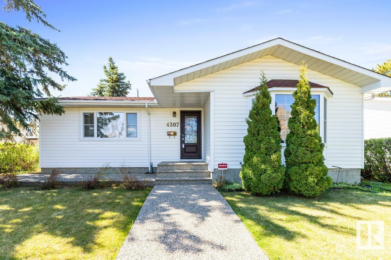 Property Photo: 4307 109A Avenue NW AB T6A 1S3