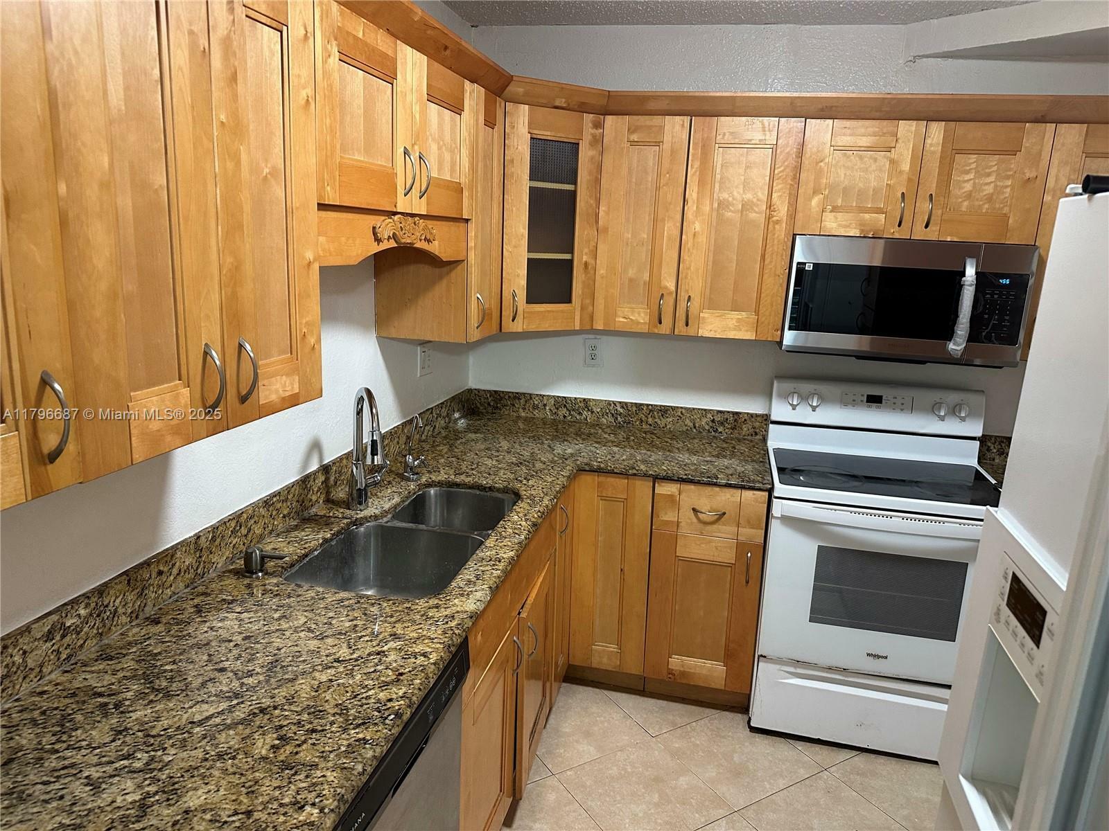 Property Photo: 4394 NW 9th Ave 21-3C FL 33064