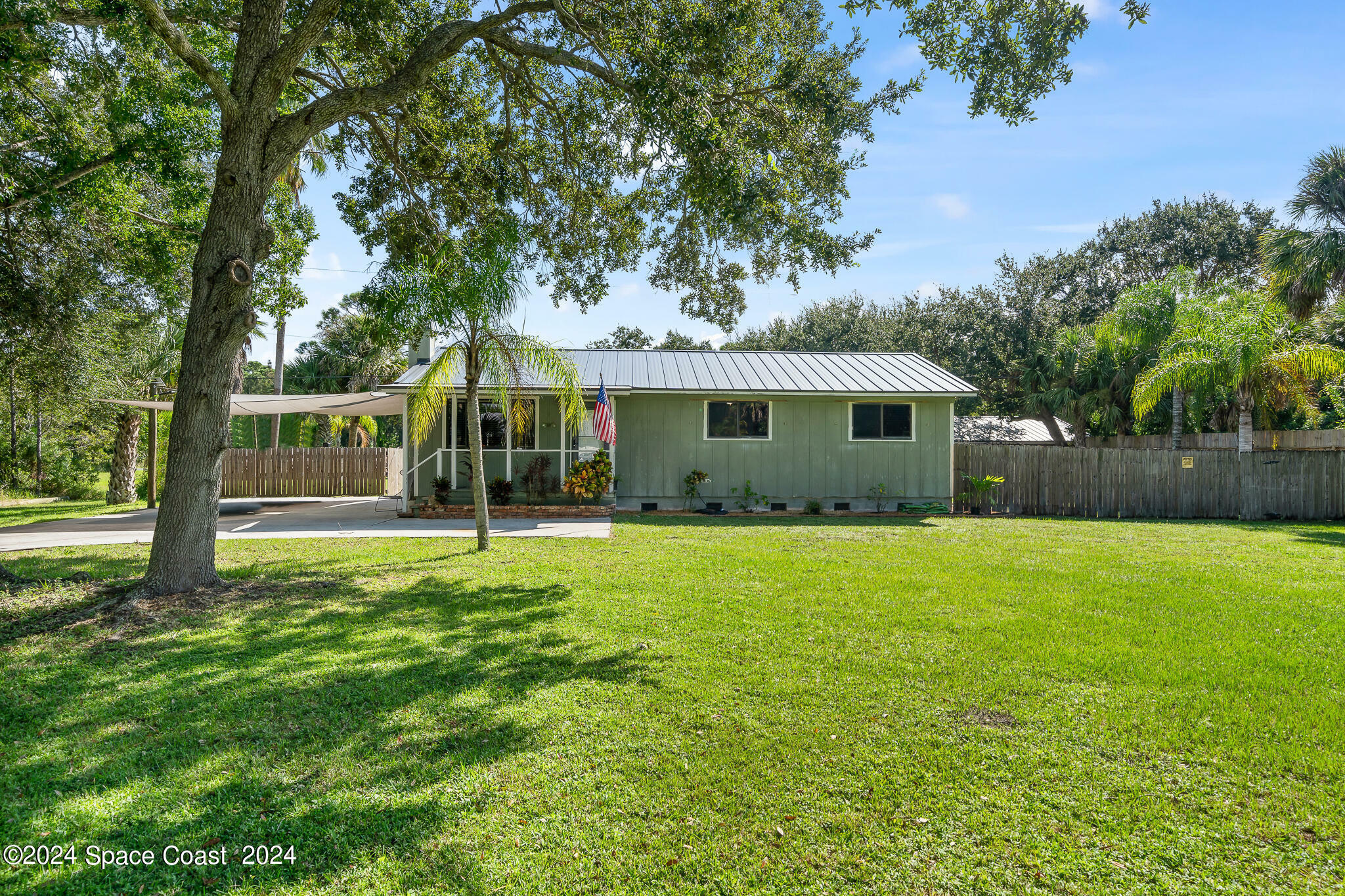 Property Photo: 9633 Honeysuckle Drive FL 32976
