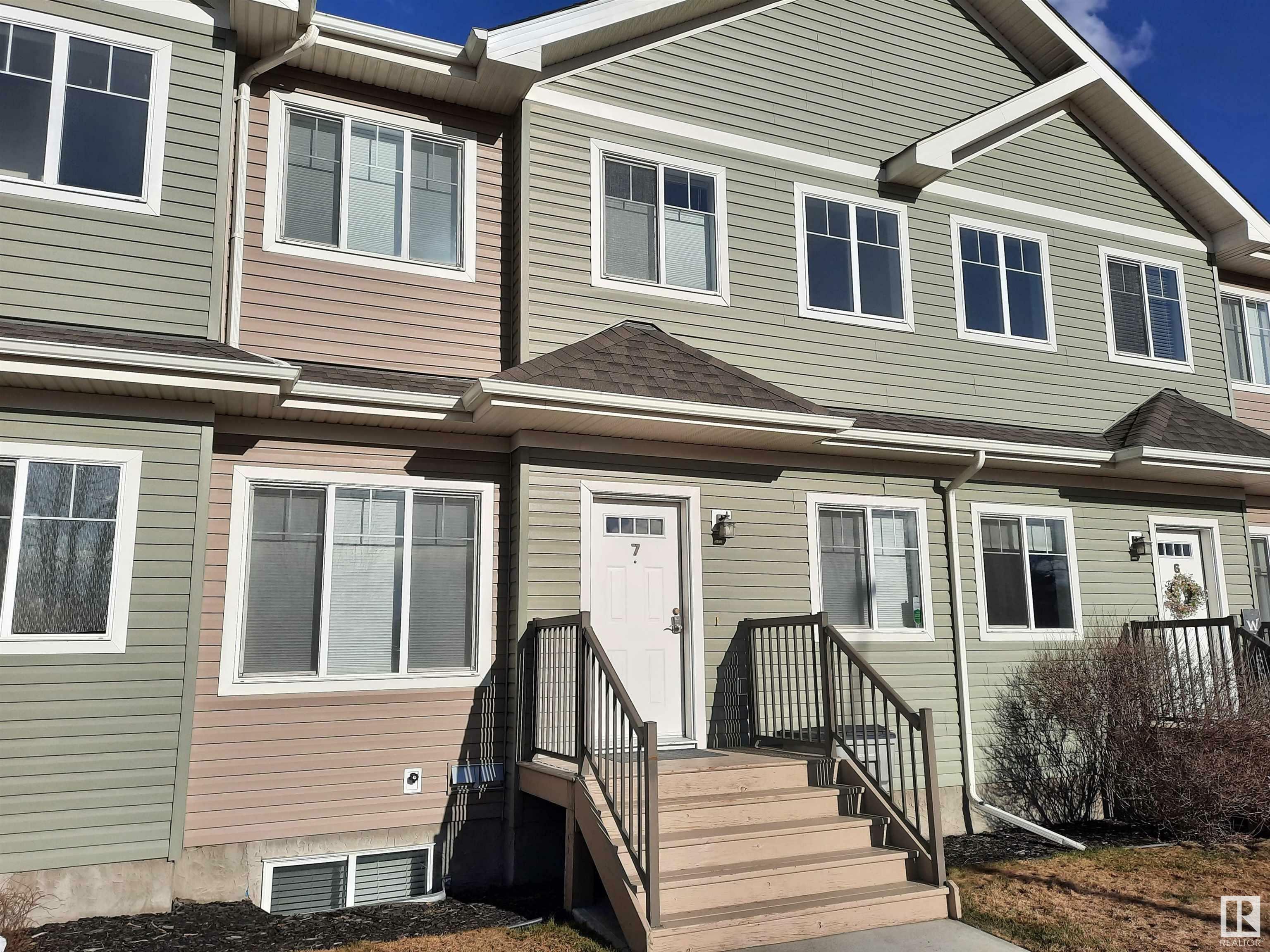Property Photo: 300 Queen Street 7 AB T7X 2J1