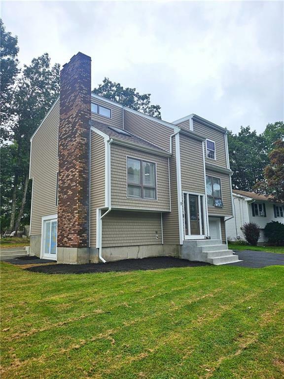 Property Photo: 8 Bicentennial Way RI 02909