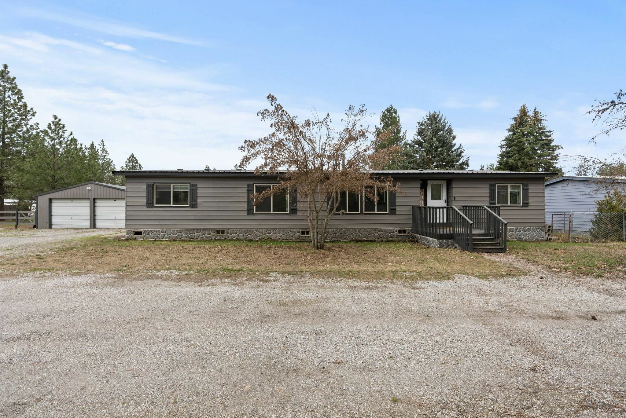 Property Photo: 3210 E Denison-Chattaroy Rd WA 99003
