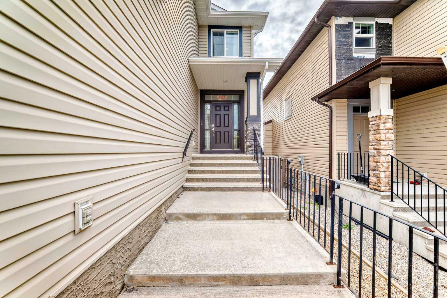Property Photo: 1432 Panatella Boulevard NW AB T3K 0W2