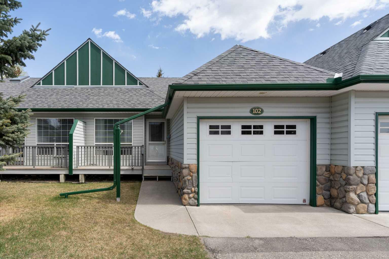 Property Photo: 102 Baker Creek Drive AB T1V 1V6