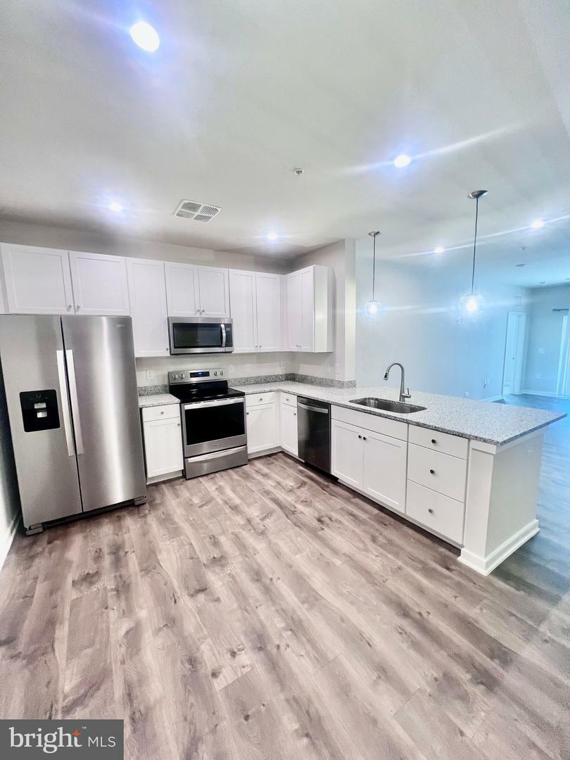 Property Photo: 750 Mount Airy Terrace NE 106 VA 20176