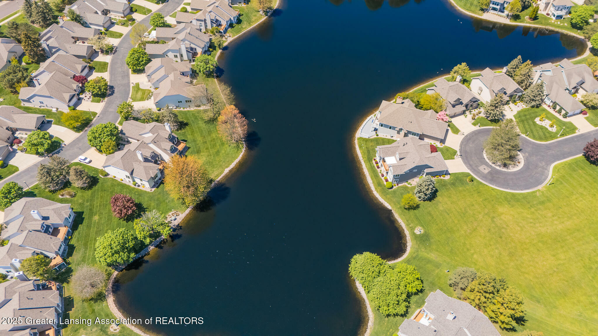 Property Photo: 514 Burgenstock Drive MI 48917