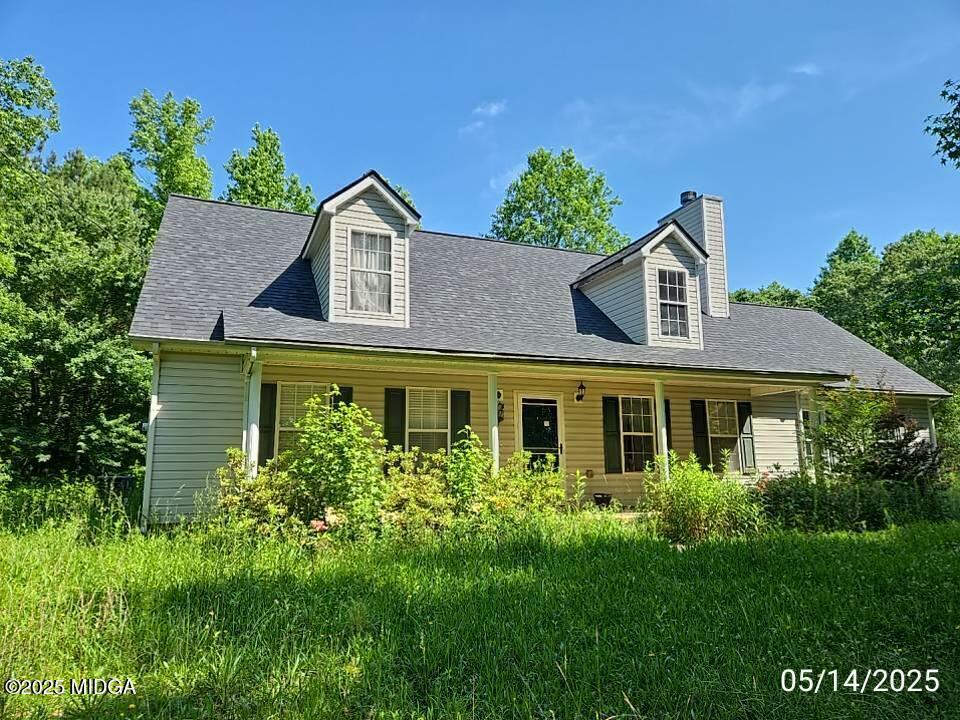 Property Photo: 5615 Highway 81 E GA 30252