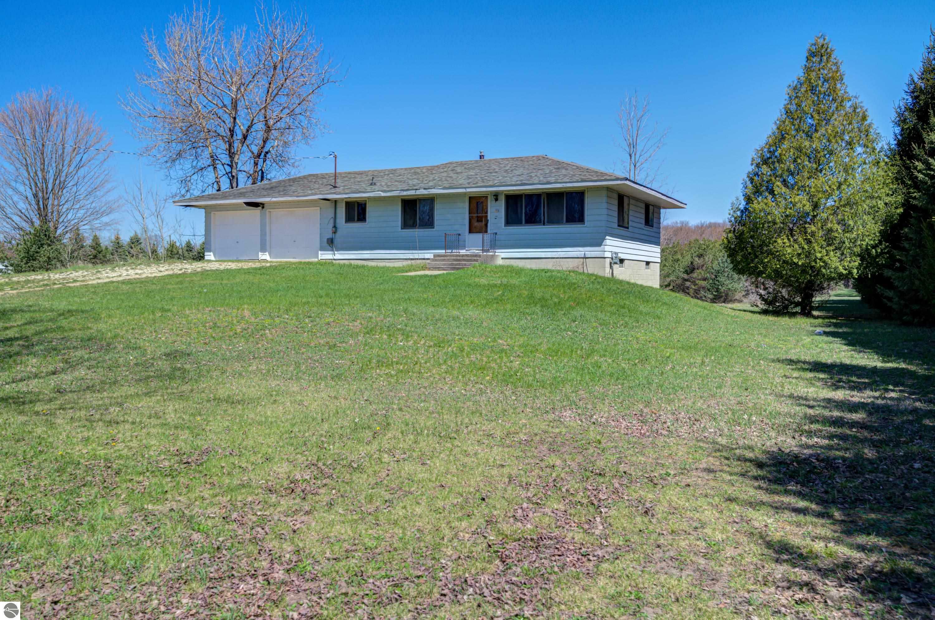 Property Photo: 5260 W Blair Townhall Road MI 49637