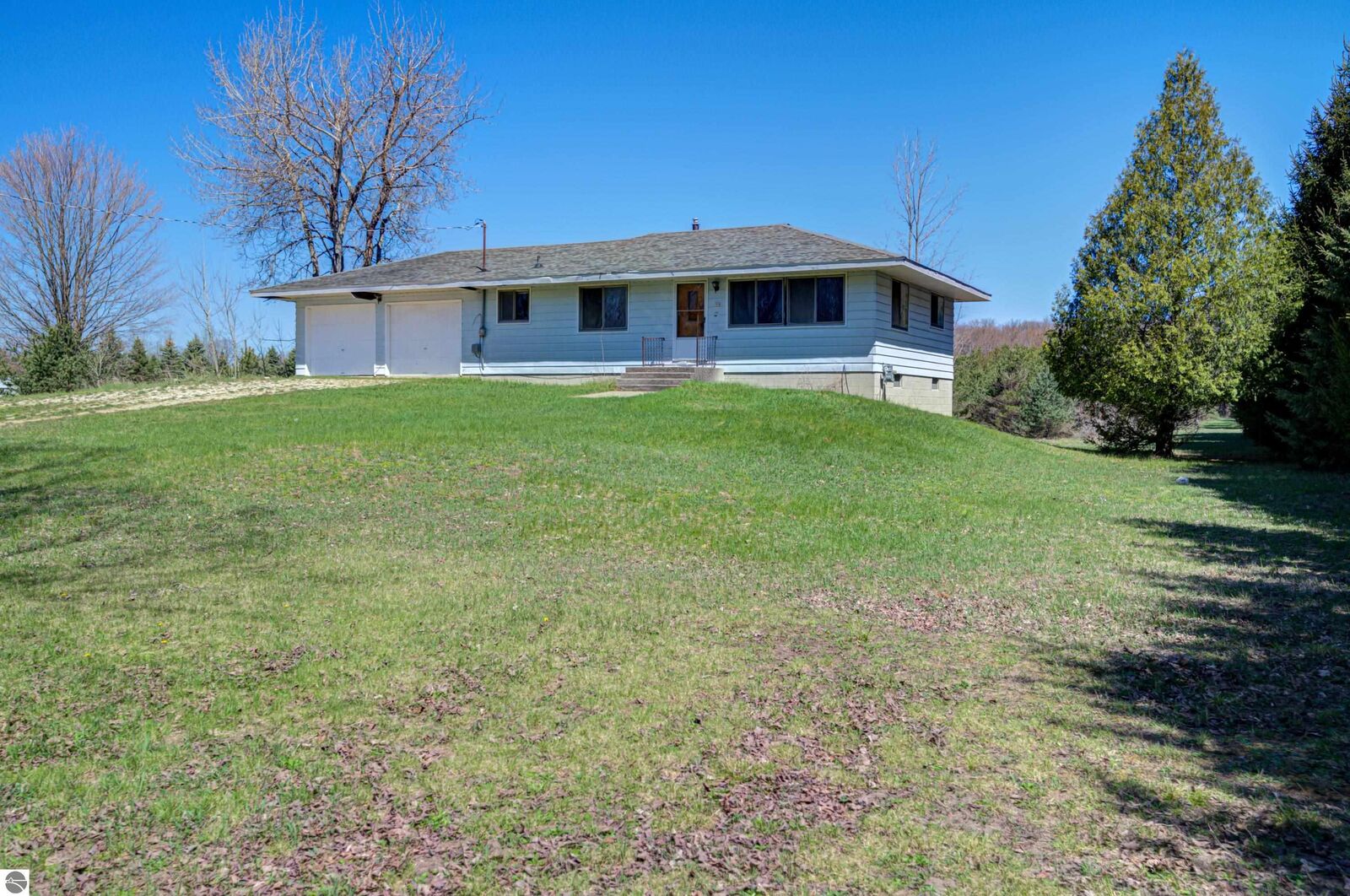 Property Photo:  5260 W Blair Townhall Road  MI 49637 