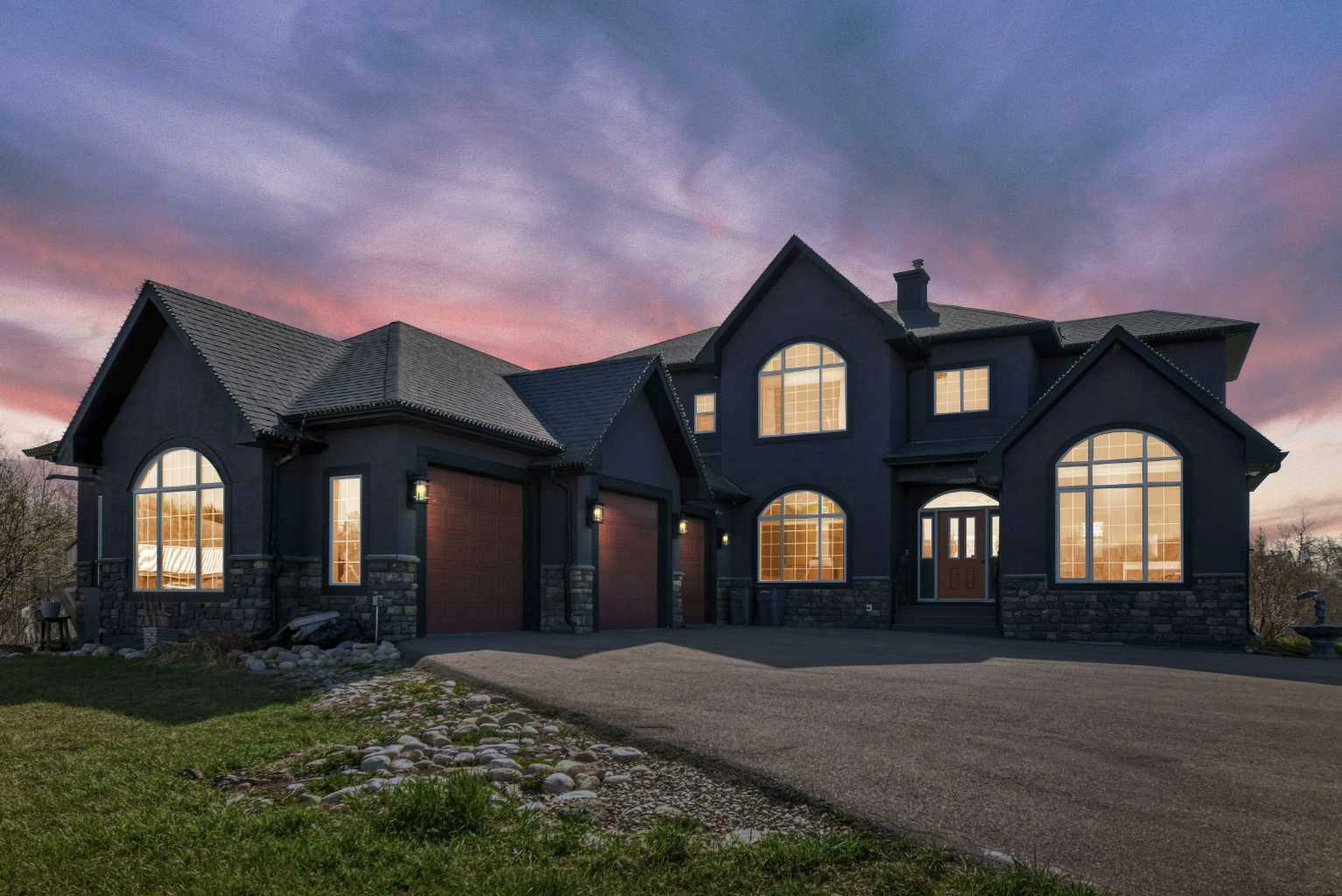 Property Photo: 298034 218 Street W AB T1S 2Y6