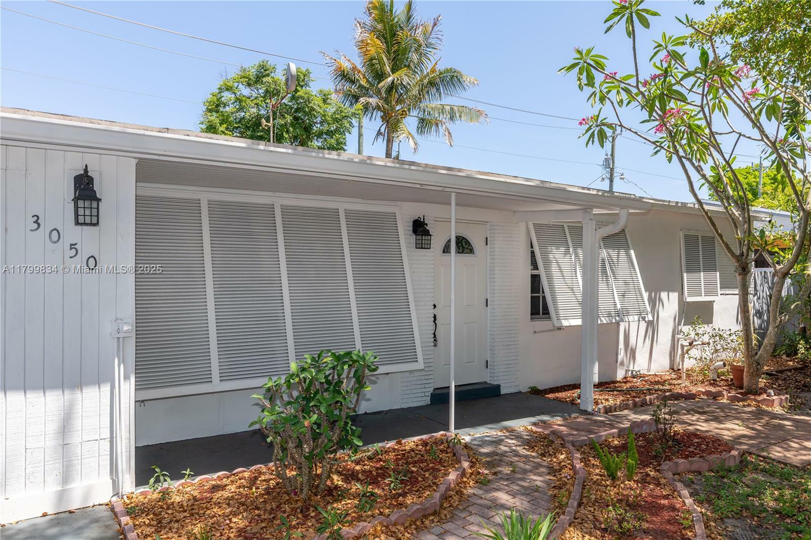 Property Photo: 3050 NE 13th Ave FL 33064
