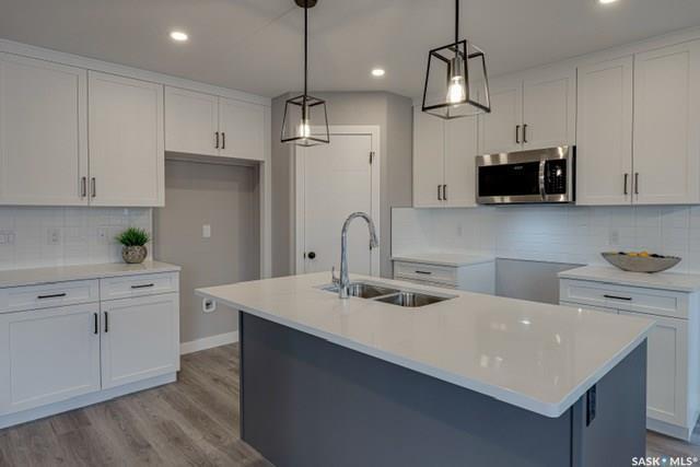 Property Photo: 207 Asokan Street SK S7L 7P3