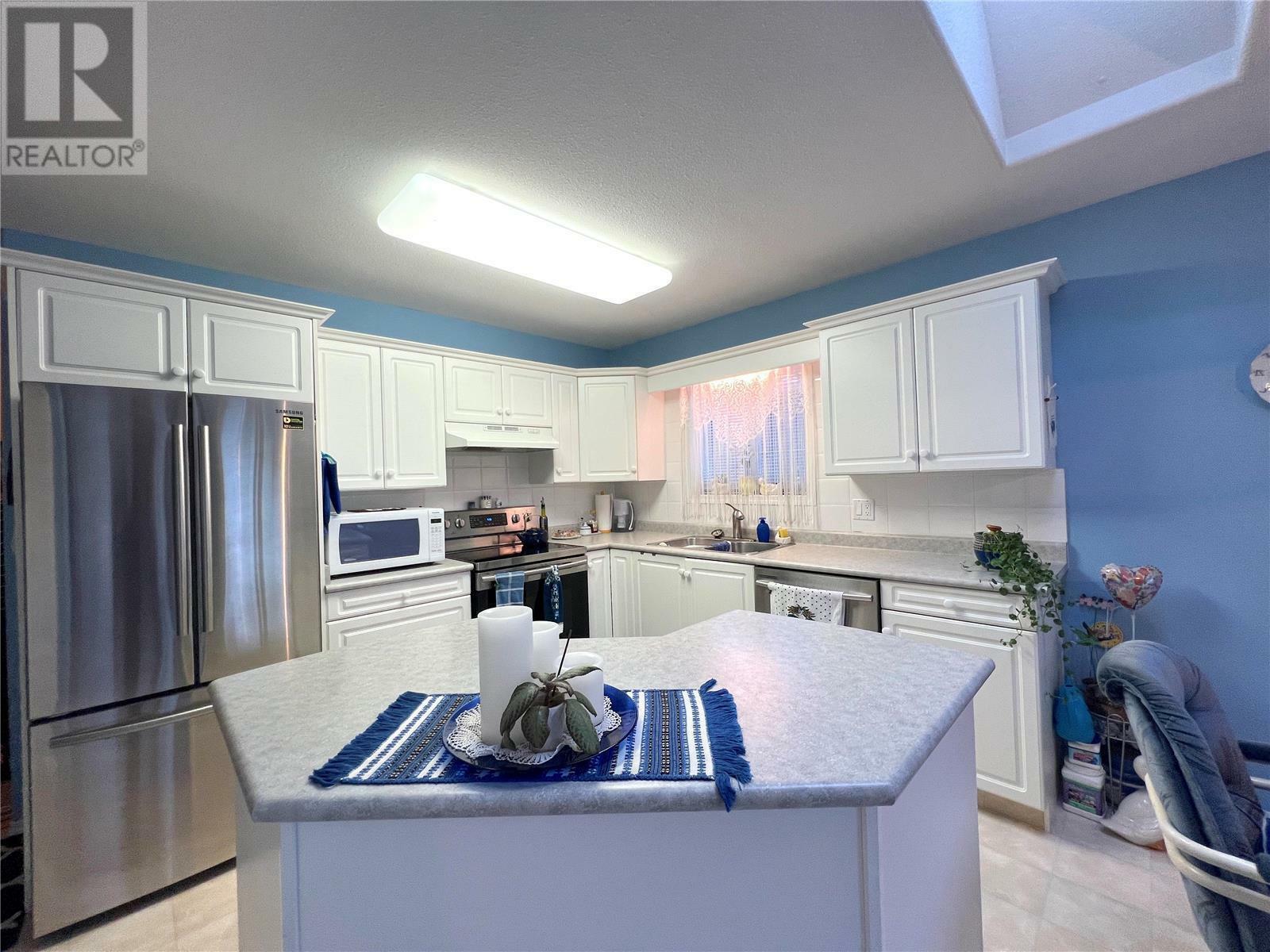 Property Photo: 2250 Louie Drive 103 BC V4T 2M6